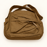 Multi-Pocket Handbag — Brown — AI-styled studio image