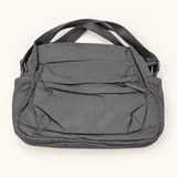 Multi-Pocket Handbag — Grey — AI-styled studio image