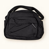 Multi-Pocket Handbag — Black — AI-styled studio image