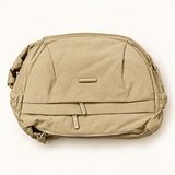 Rounded Everyday Sling — Beige — AI-styled studio image