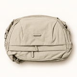 Rounded Everyday Sling — Ivory — AI-styled studio image