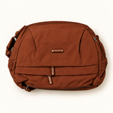 Rounded Everyday Sling — Rust — AI-styled studio image