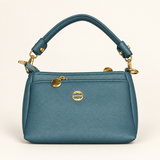 Everyday Multi Zip Sling Bag — teal — studio image