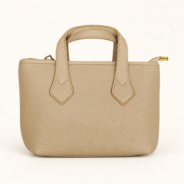 Pebble Mini Sling Bag — Beige — studio image
