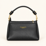 Gold Clip Handle Sling Bag — black — studio image