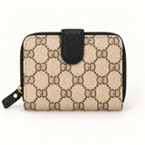 Monogram Tab Zip Wallet — Black — individual studio photo