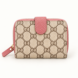 Monogram Tab Zip Wallet — Dusty Pink — individual studio photo