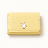 Rabbit Emblem Compact Wallet — Pale Yellow — individual studio photo