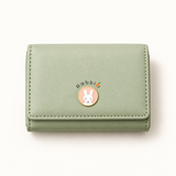 Rabbit Emblem Compact Wallet — Sage Green — individual studio photo